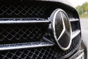Close-up of Mercedes-Benz luxury emblem for Montreux private transfer fleet 